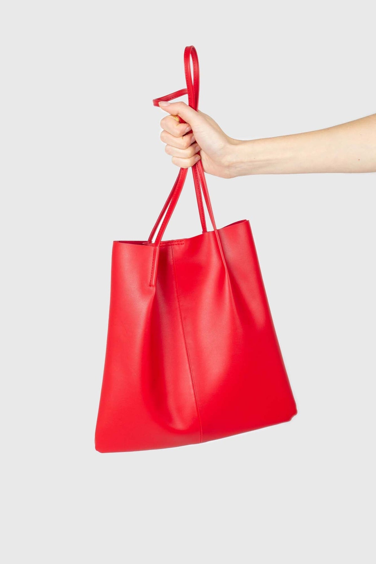 Red vegan leather pinched strap tote bag