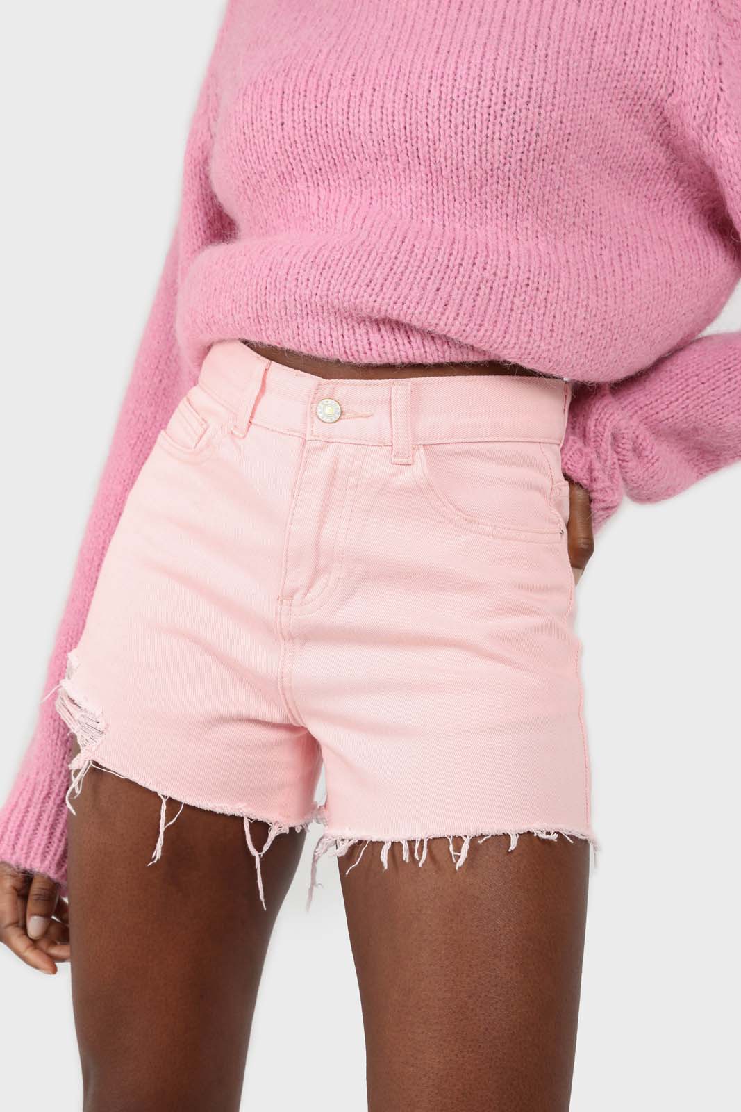 Pink raw hem denim shorts