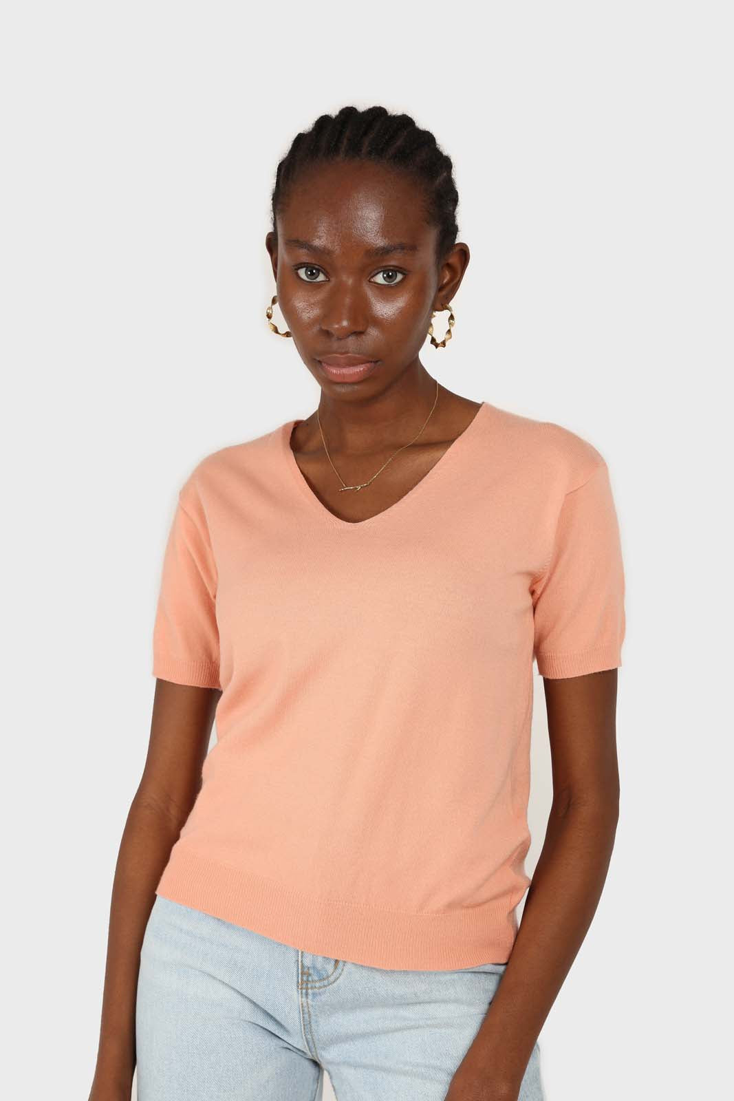 Pale orange V-neck short sleeved knit top