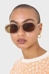 All beige thick oval frame sunglasses
