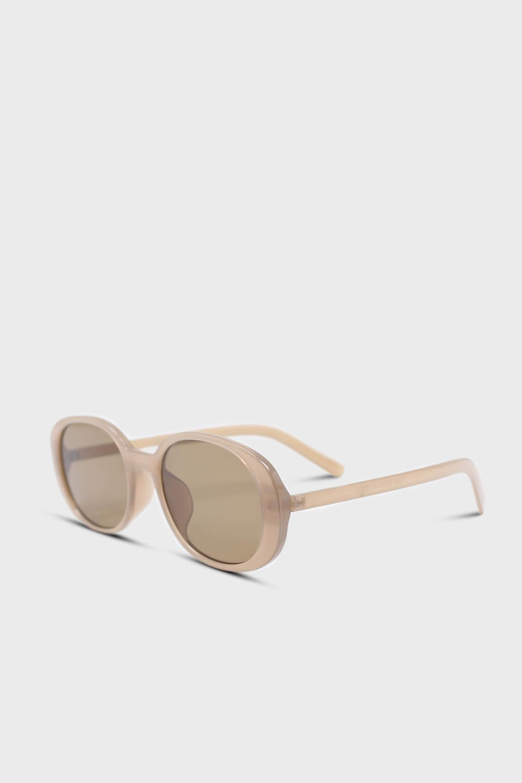 All beige thick oval frame sunglasses
