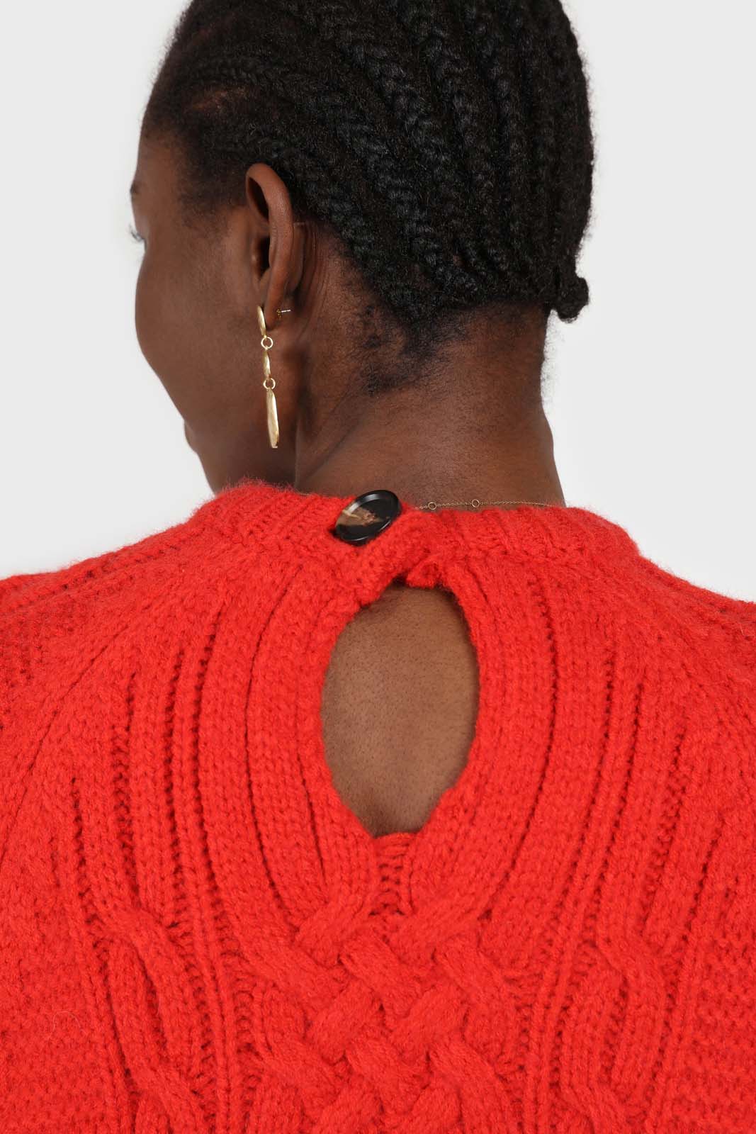 Bright red chunky cable knit balloon sleeved jumper