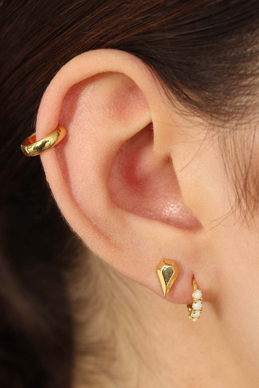 Gold tiny diamond stud earrings
