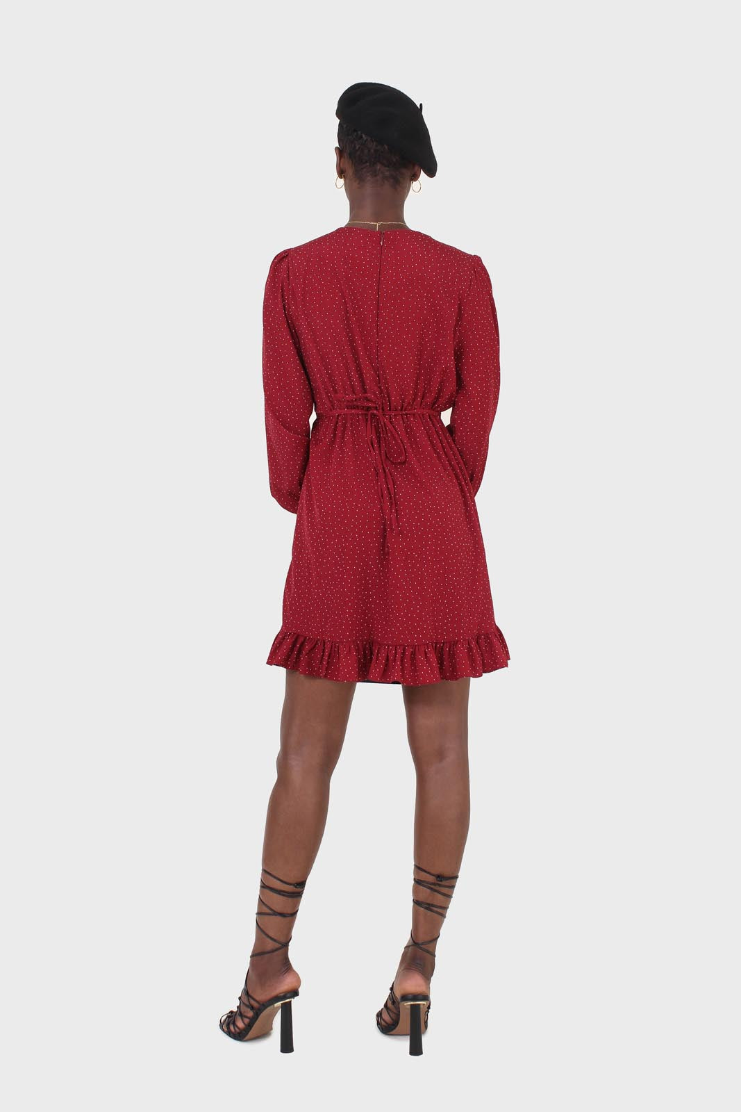 Red polka dot wrap front long sleeved mini dress