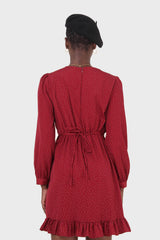 Red polka dot wrap front long sleeved mini dress