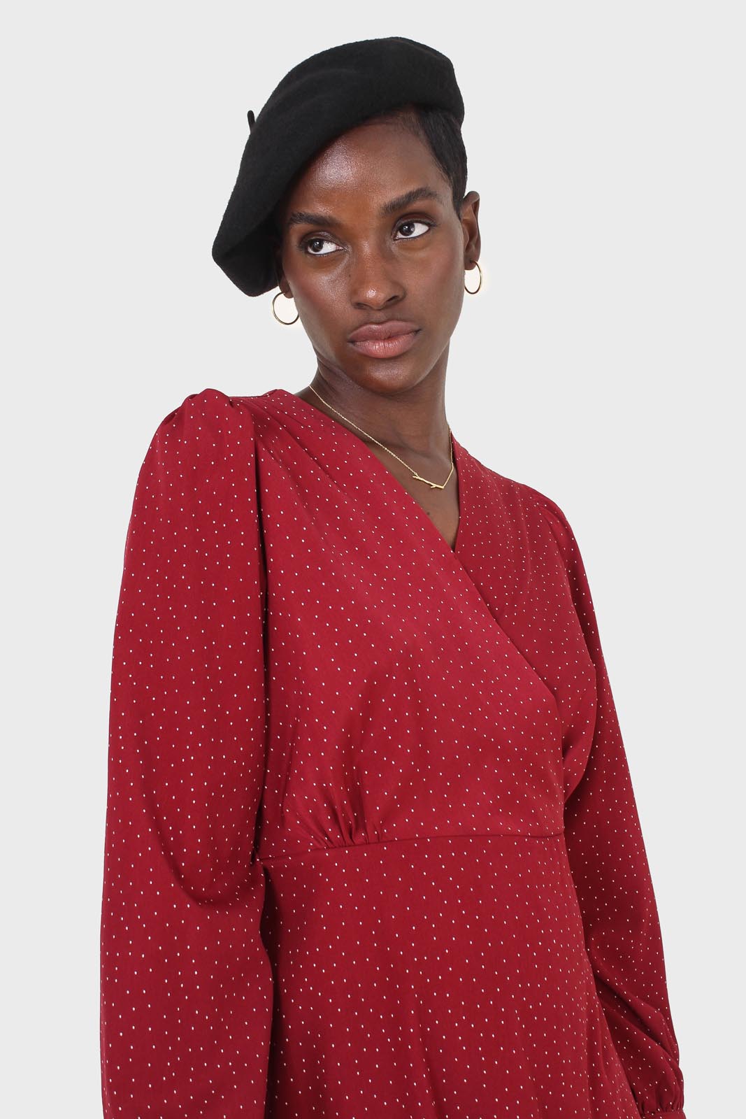 Red polka dot wrap front long sleeved mini dress
