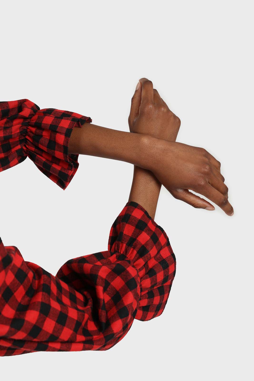 Red and black checked pull string long sleeved top