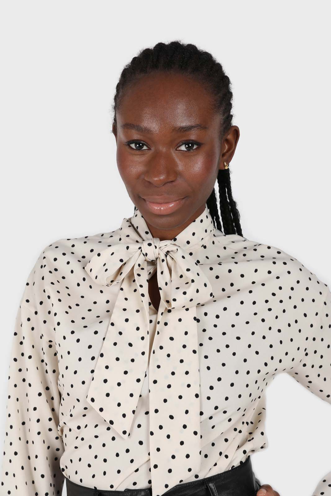 Ivory and black polka dots tie neck blouse