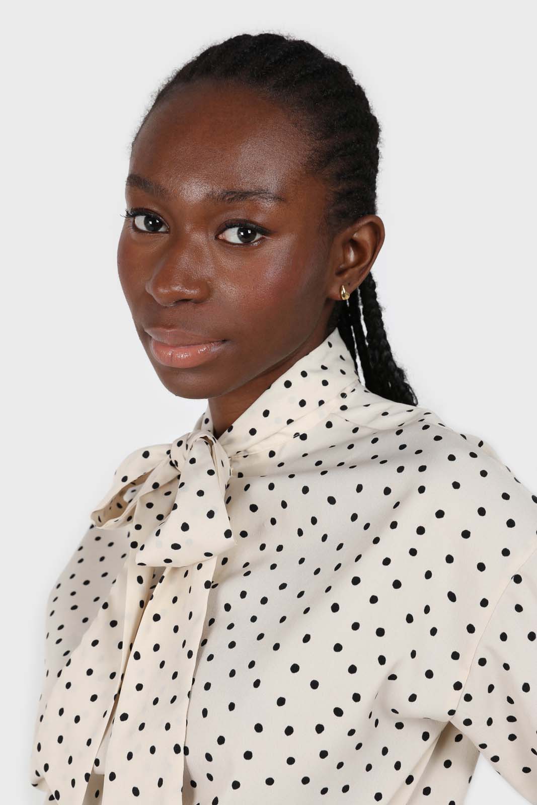 Ivory and black polka dots tie neck blouse