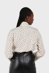 Ivory and black polka dots tie neck blouse