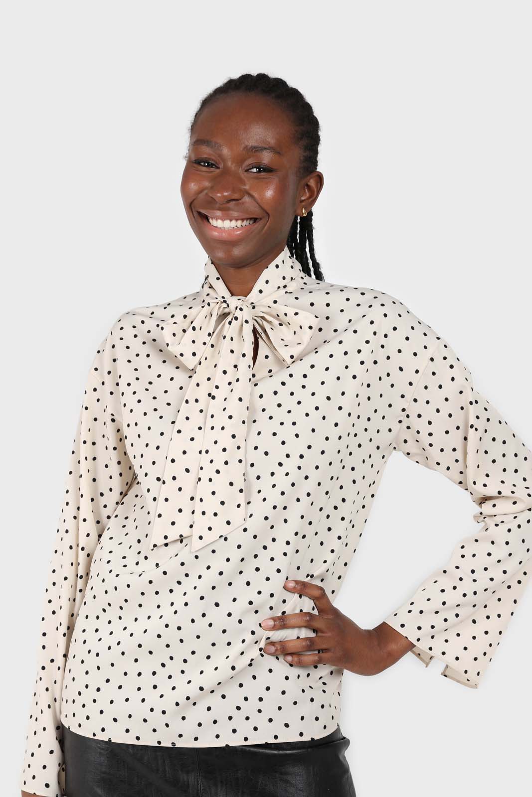 Ivory and black polka dots tie neck blouse