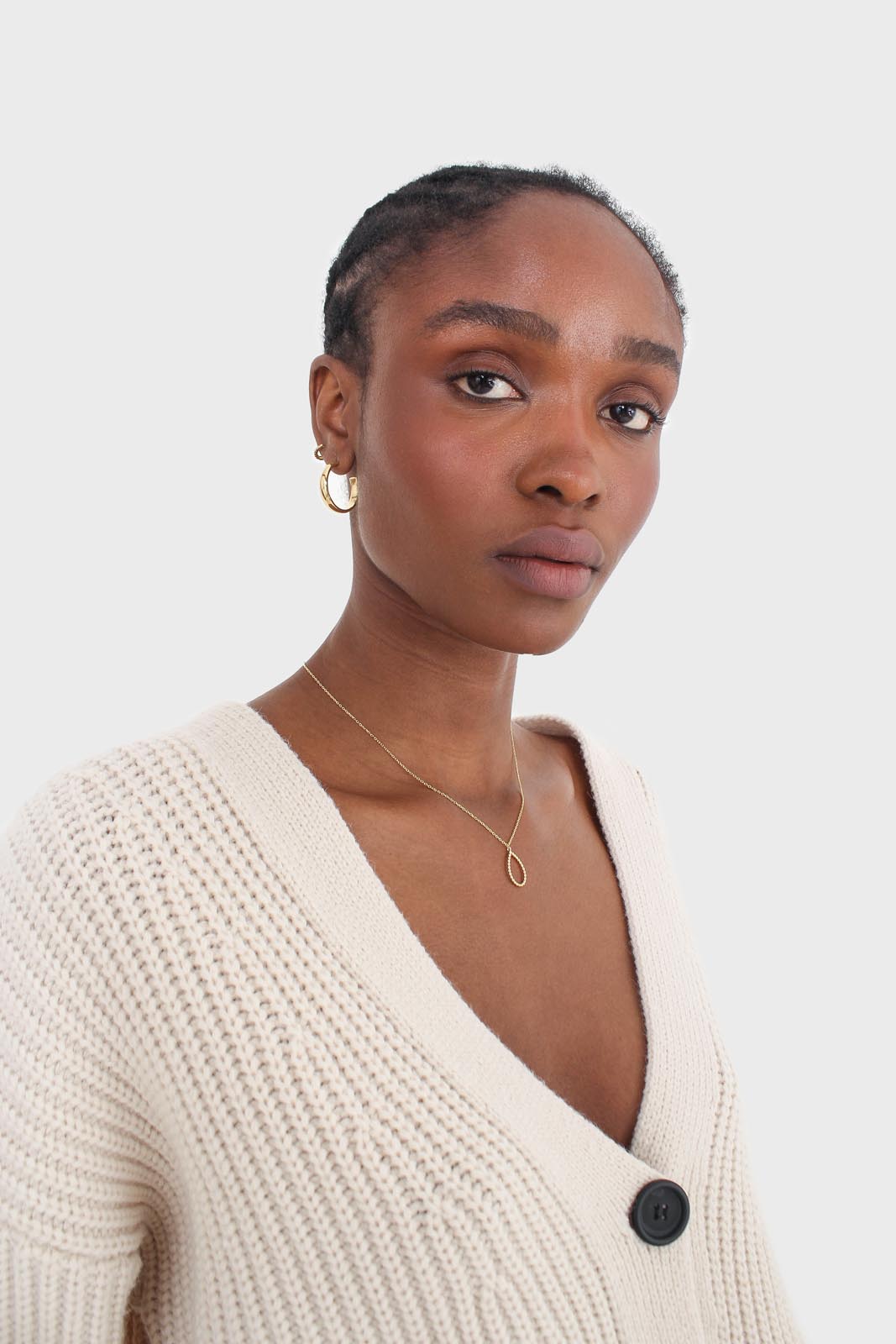 Ivory ribbed belted dark button half cardigan