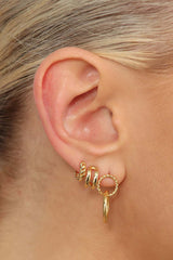 Gold linking circle earrings