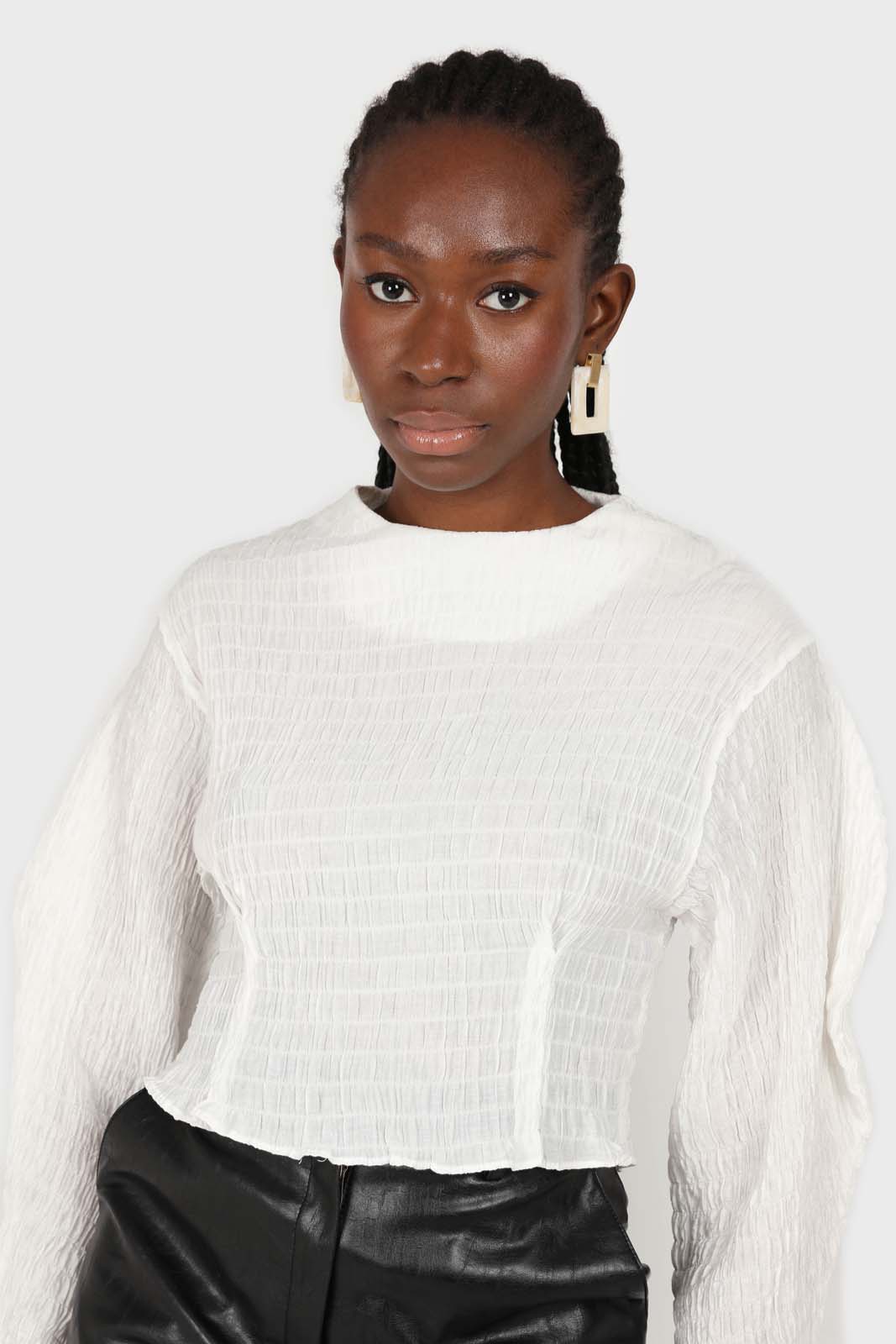 White smocked puff long sleeved top