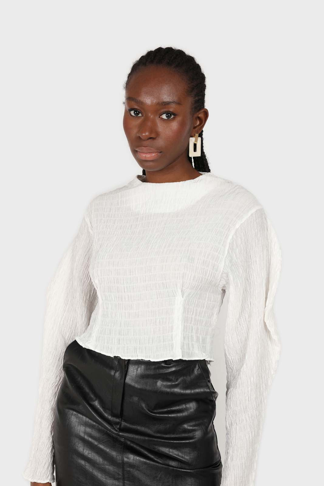White smocked puff long sleeved top