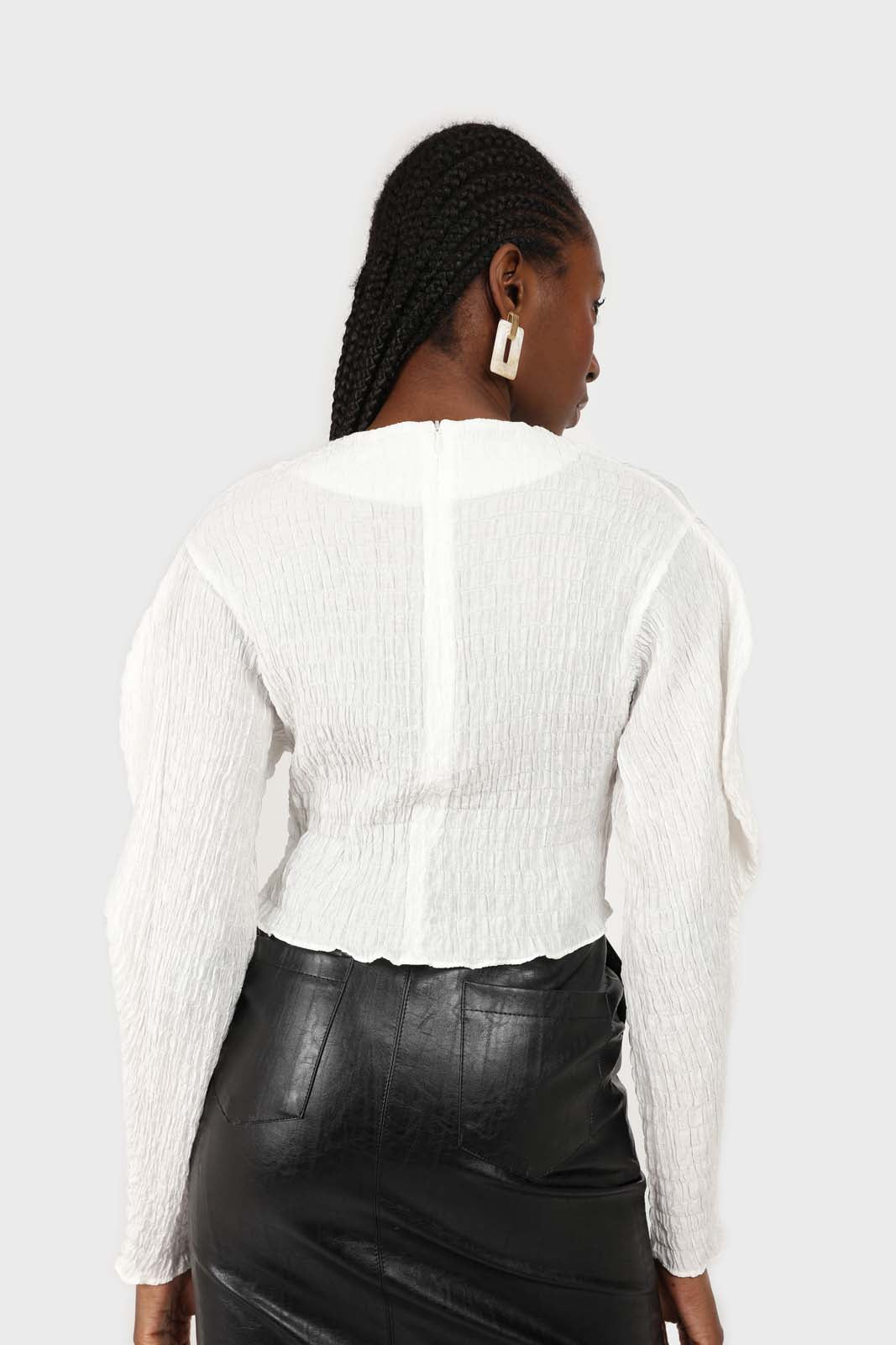 White smocked puff long sleeved top
