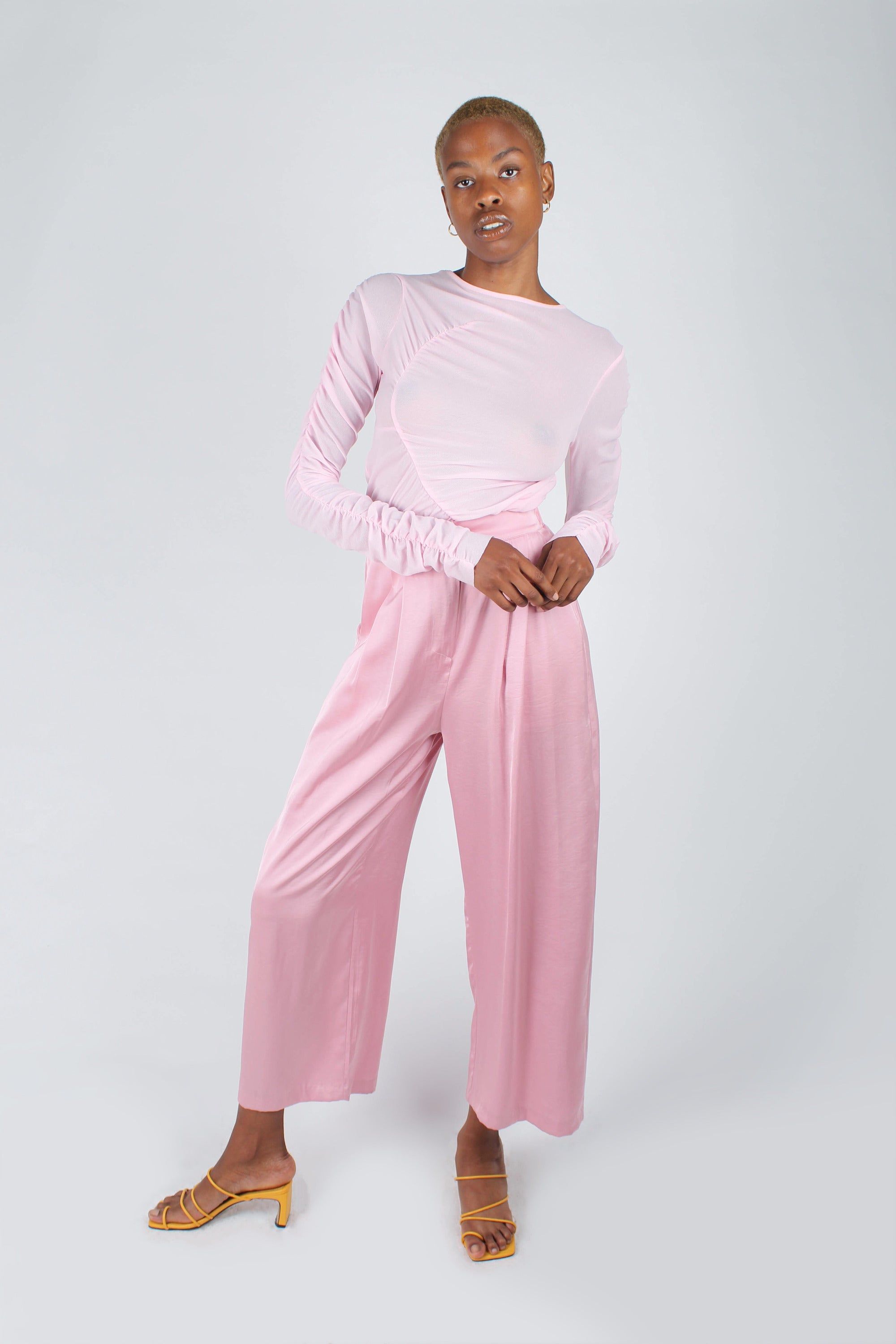 Pale pink sheer curved shirring top