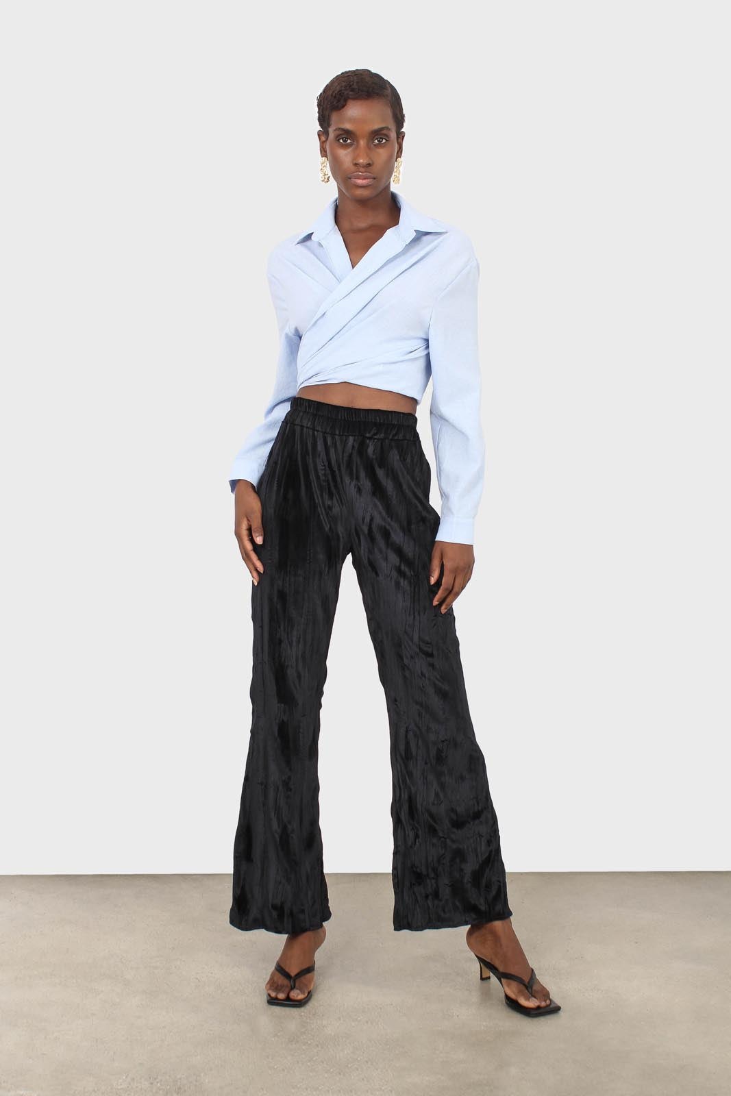 Black wrinkled loose fit trousers