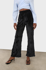 Black wrinkled loose fit trousers