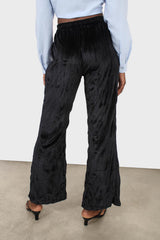 Black wrinkled loose fit trousers