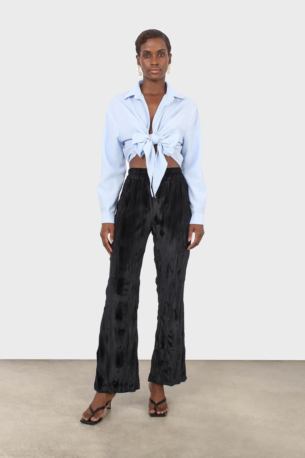 Black wrinkled loose fit trousers