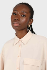 Pale pink button row silky shirt blouse