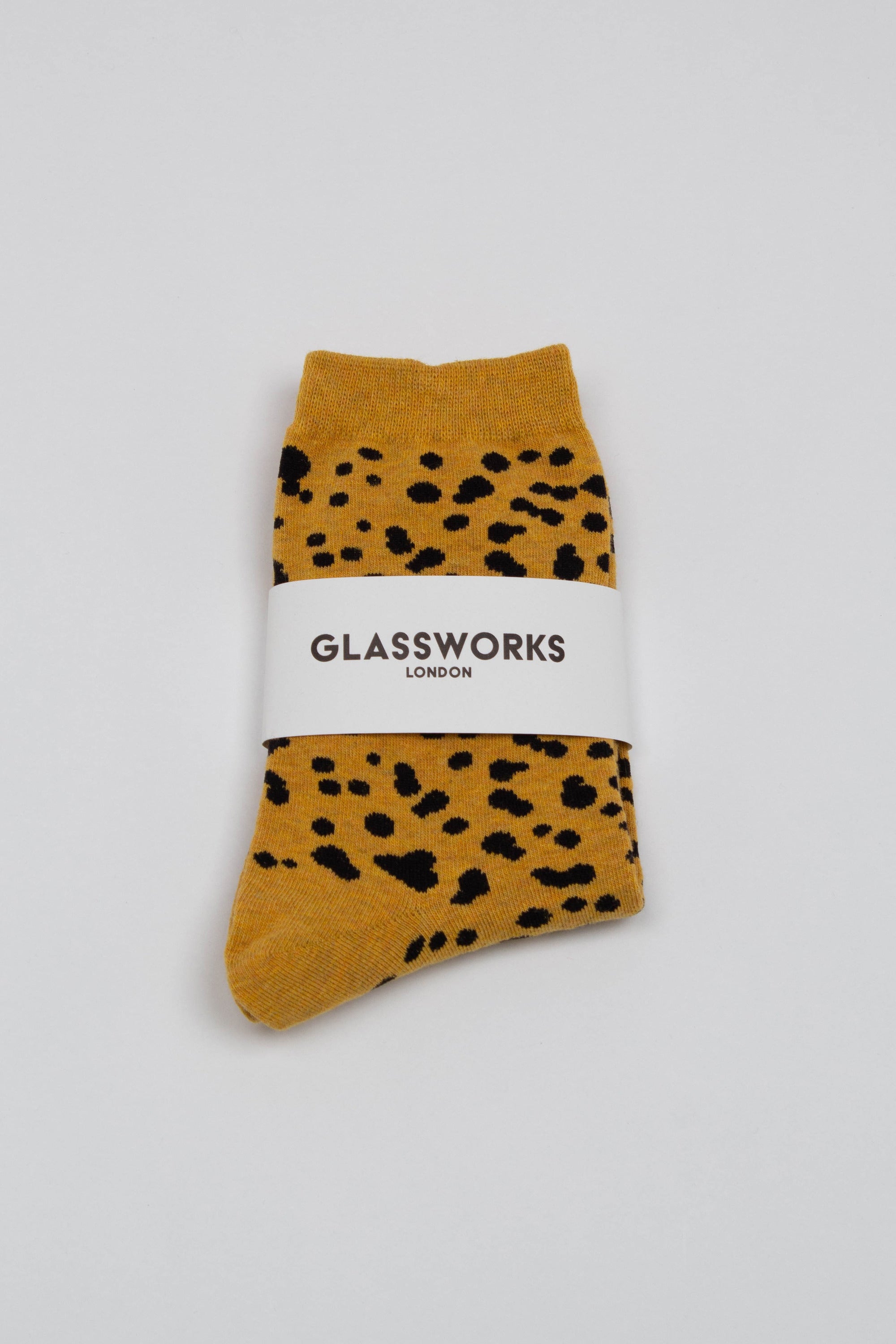 Yellow and black leopard socks