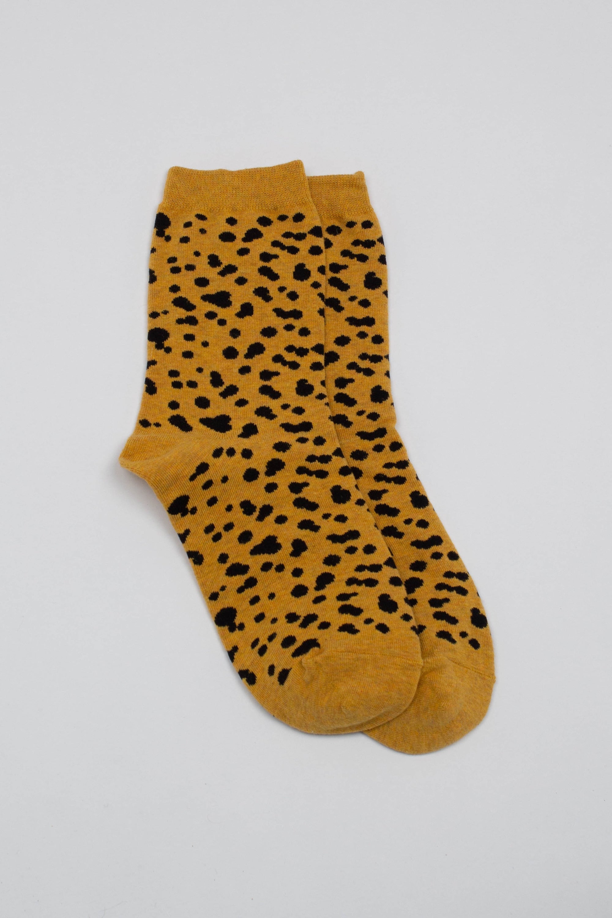 Yellow and black leopard socks
