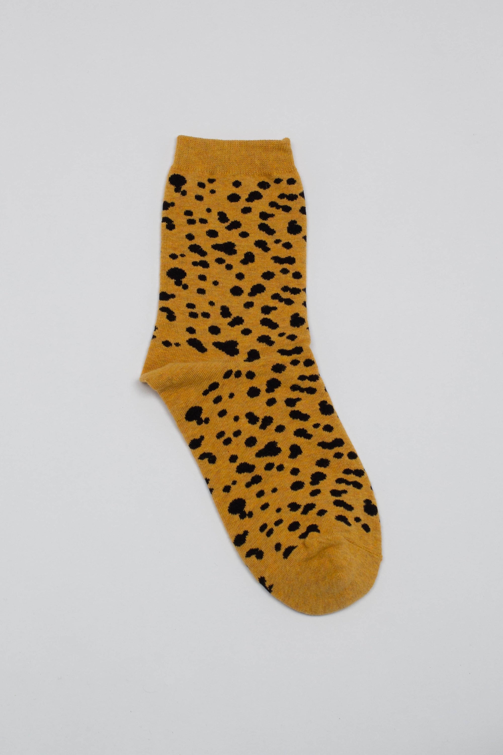 Yellow and black leopard socks