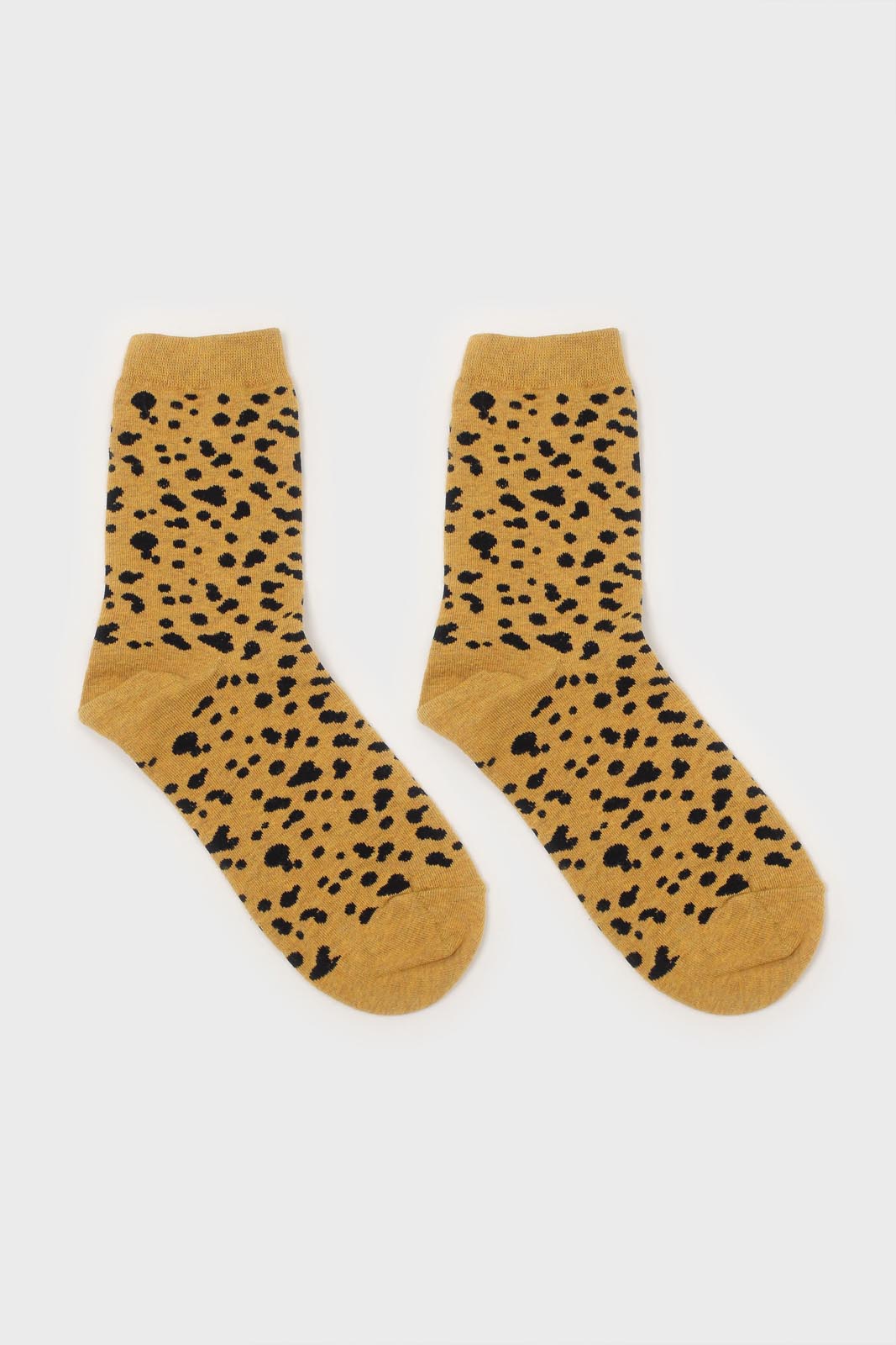 Yellow and black leopard socks