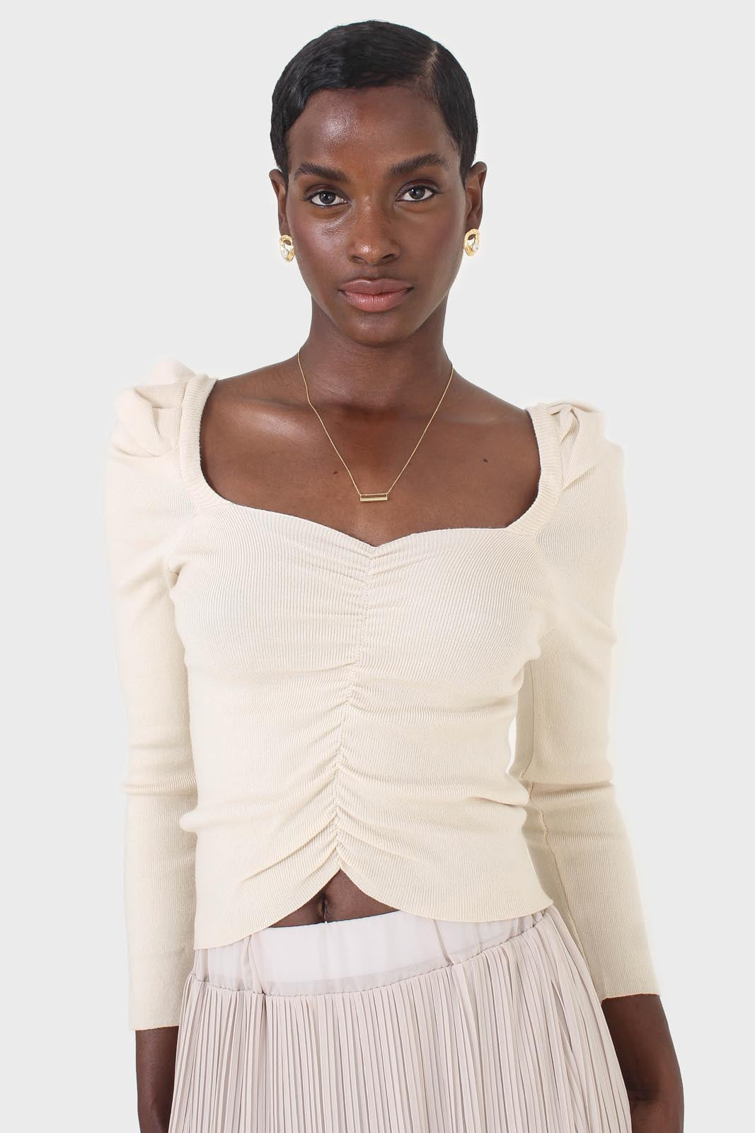 Beige gathered front long sleeved knit top