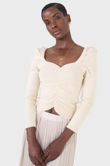 Beige gathered front long sleeved knit top