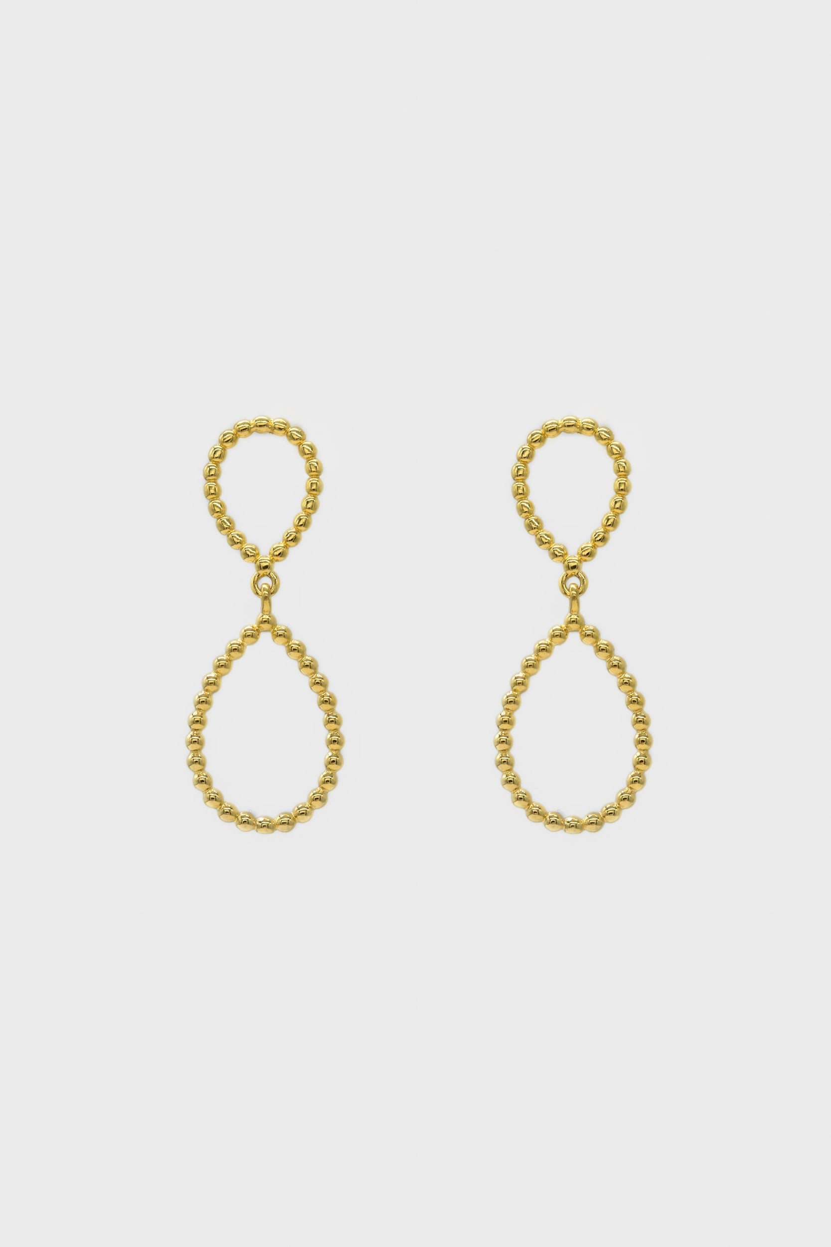 Gold pinched oval bead drop earrings