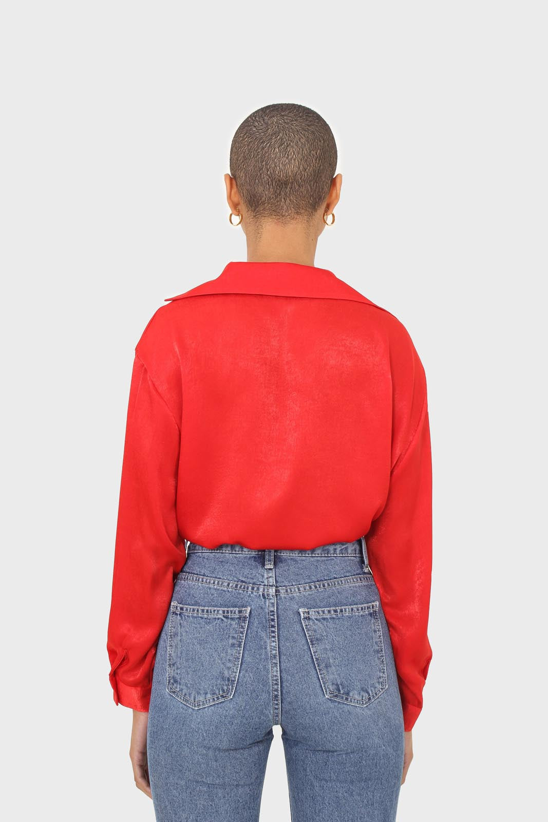 Bright red textured silky plunging tie front shirt