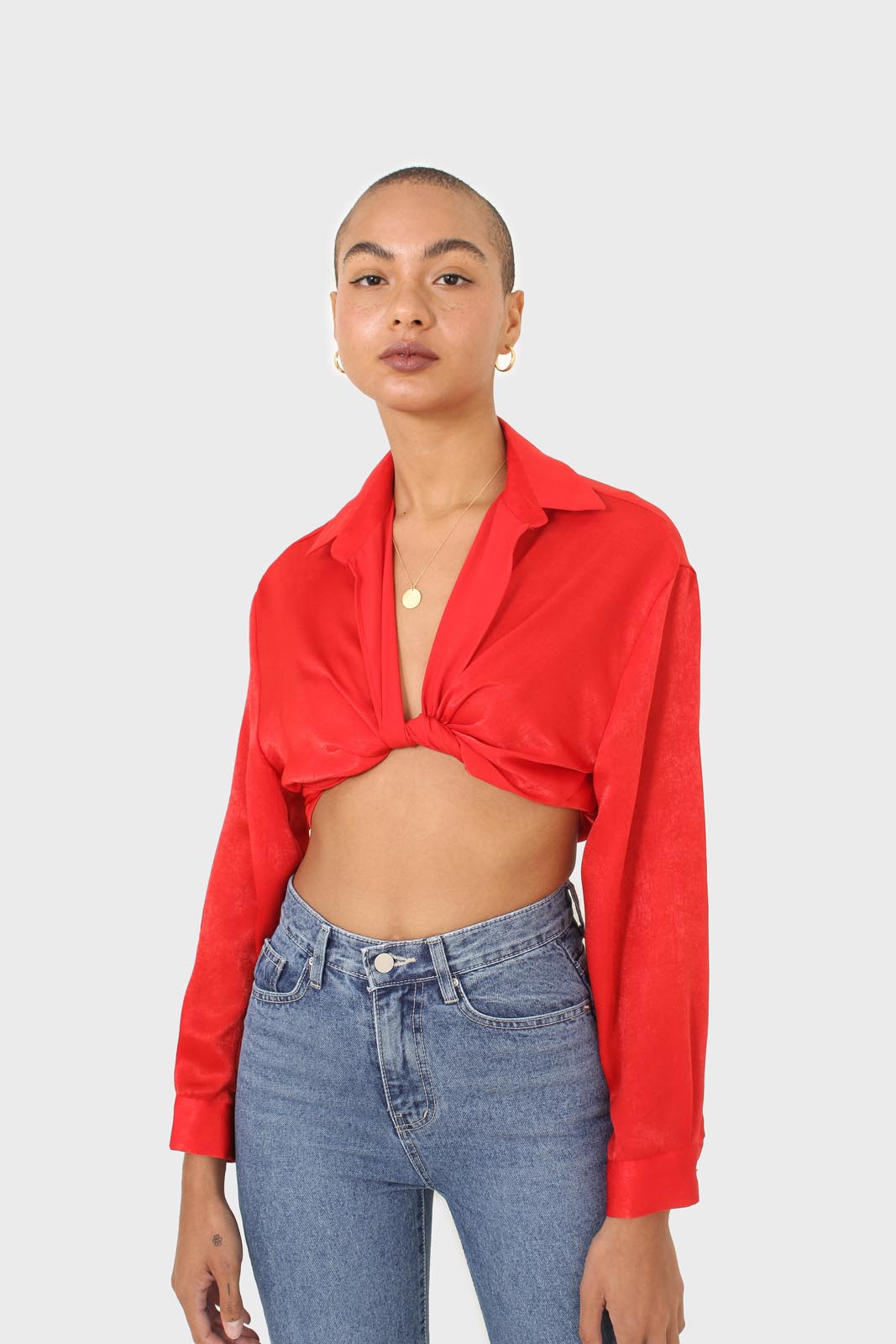 Bright red textured silky plunging tie front shirt