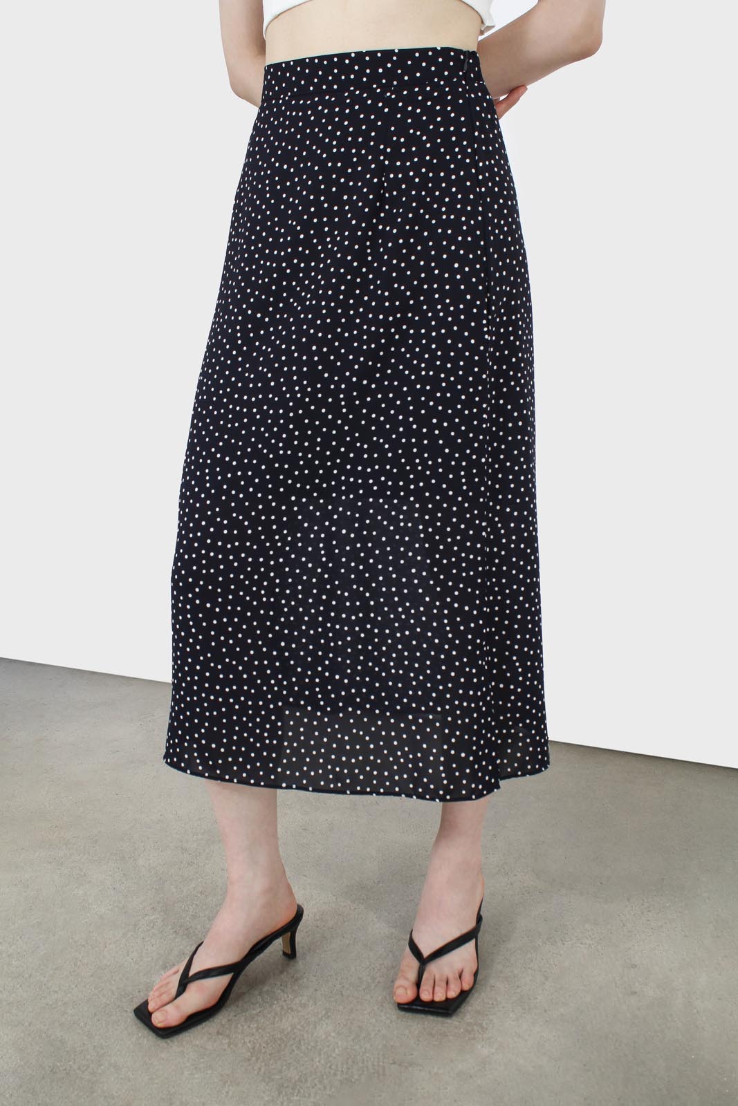 Navy and white polka dot flare midi skirt