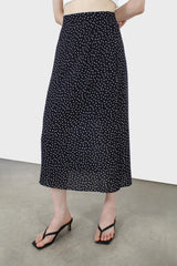 Navy and white polka dot flare midi skirt
