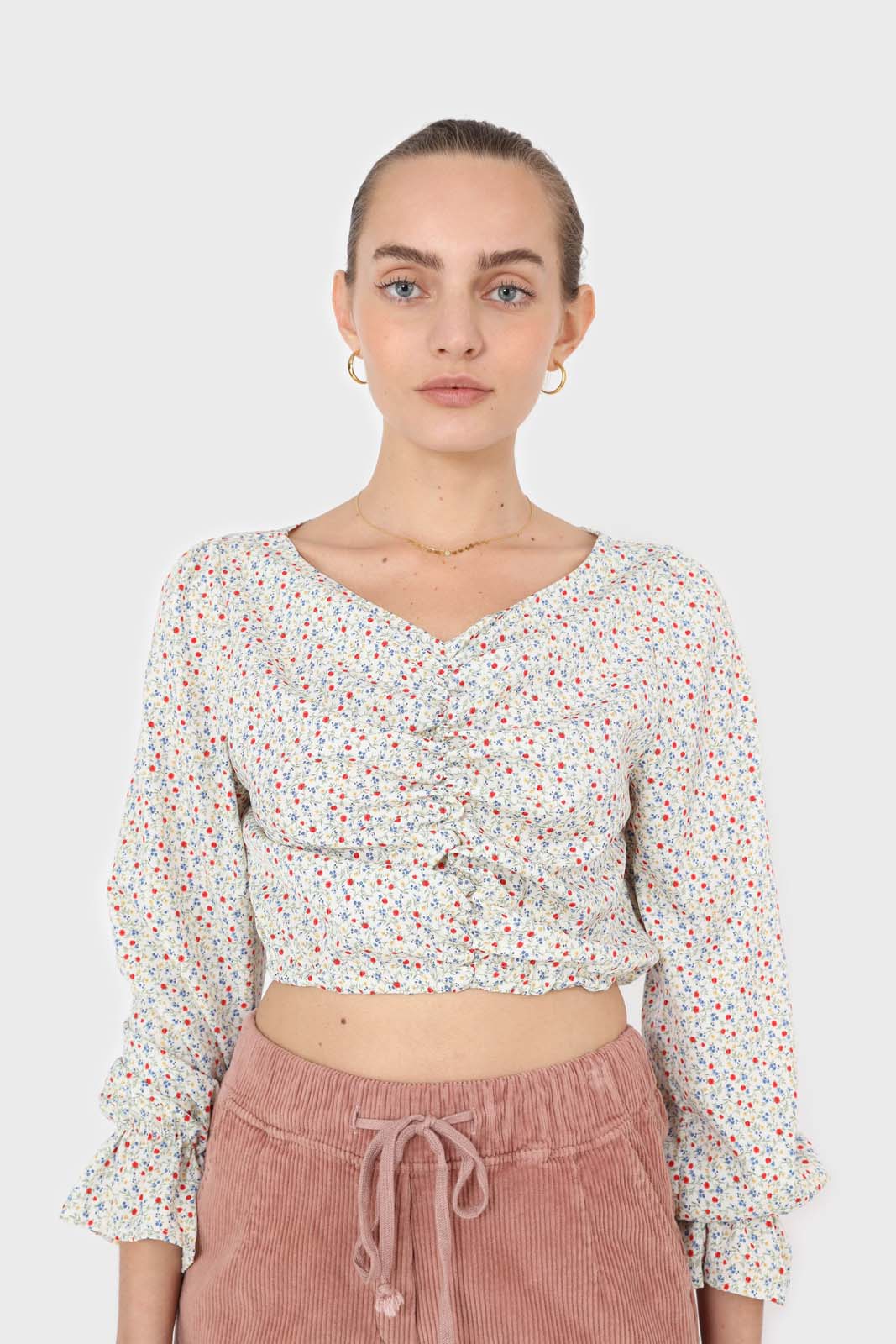 Ivory floral ruched front long sleeved blouse