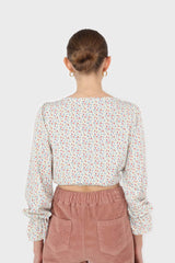 Ivory floral ruched front long sleeved blouse