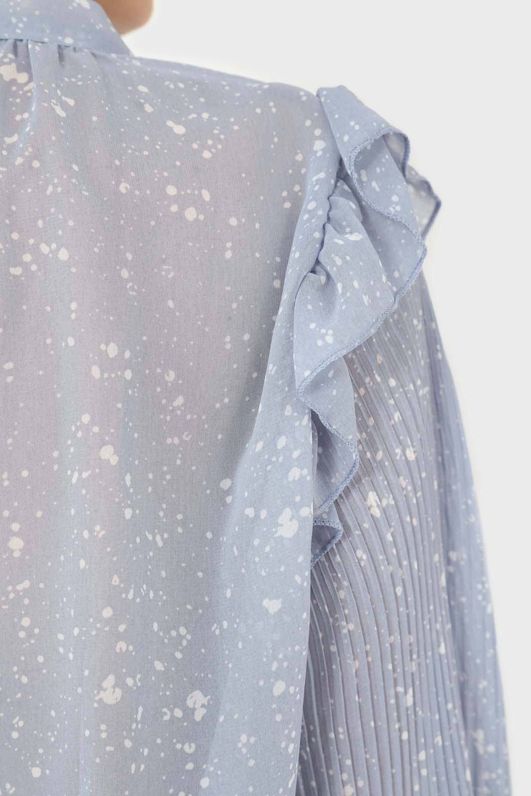 Light blue splatter print ruffled micropleat blouse