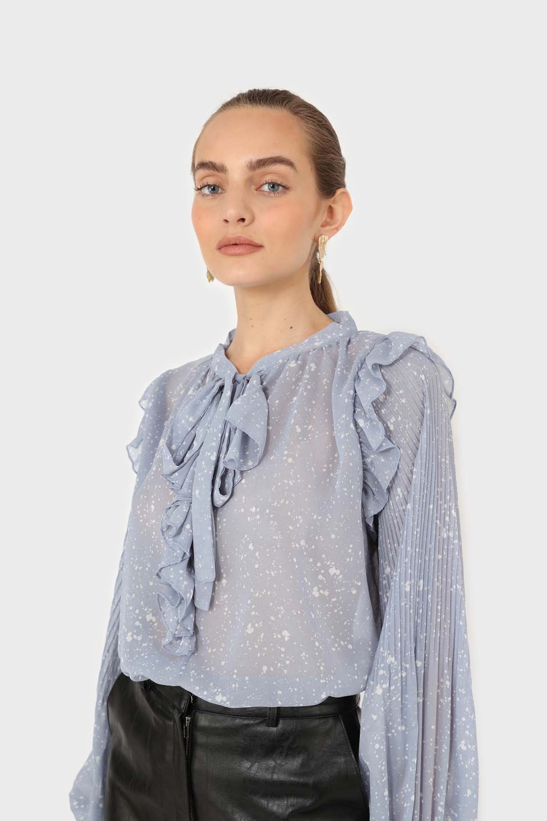 Light blue splatter print ruffled micropleat blouse