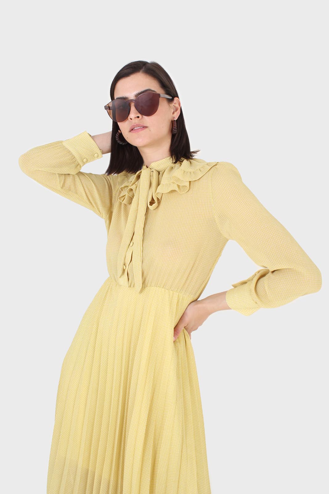 Yellow ruffle tie dress