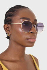 Black graded lens gold frame aviator sunglasses