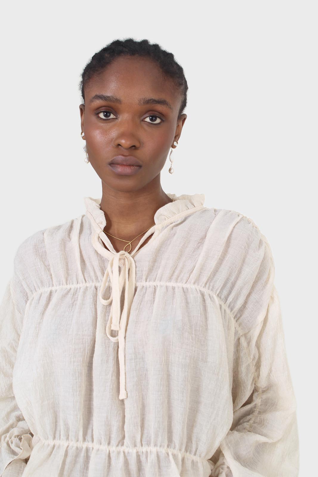Beige sheer frill cuff tiered blouse