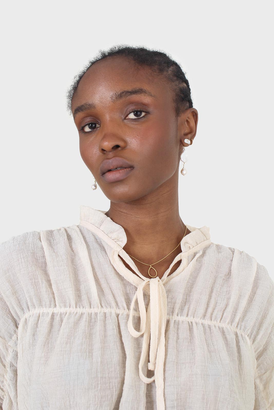 Beige sheer frill cuff tiered blouse