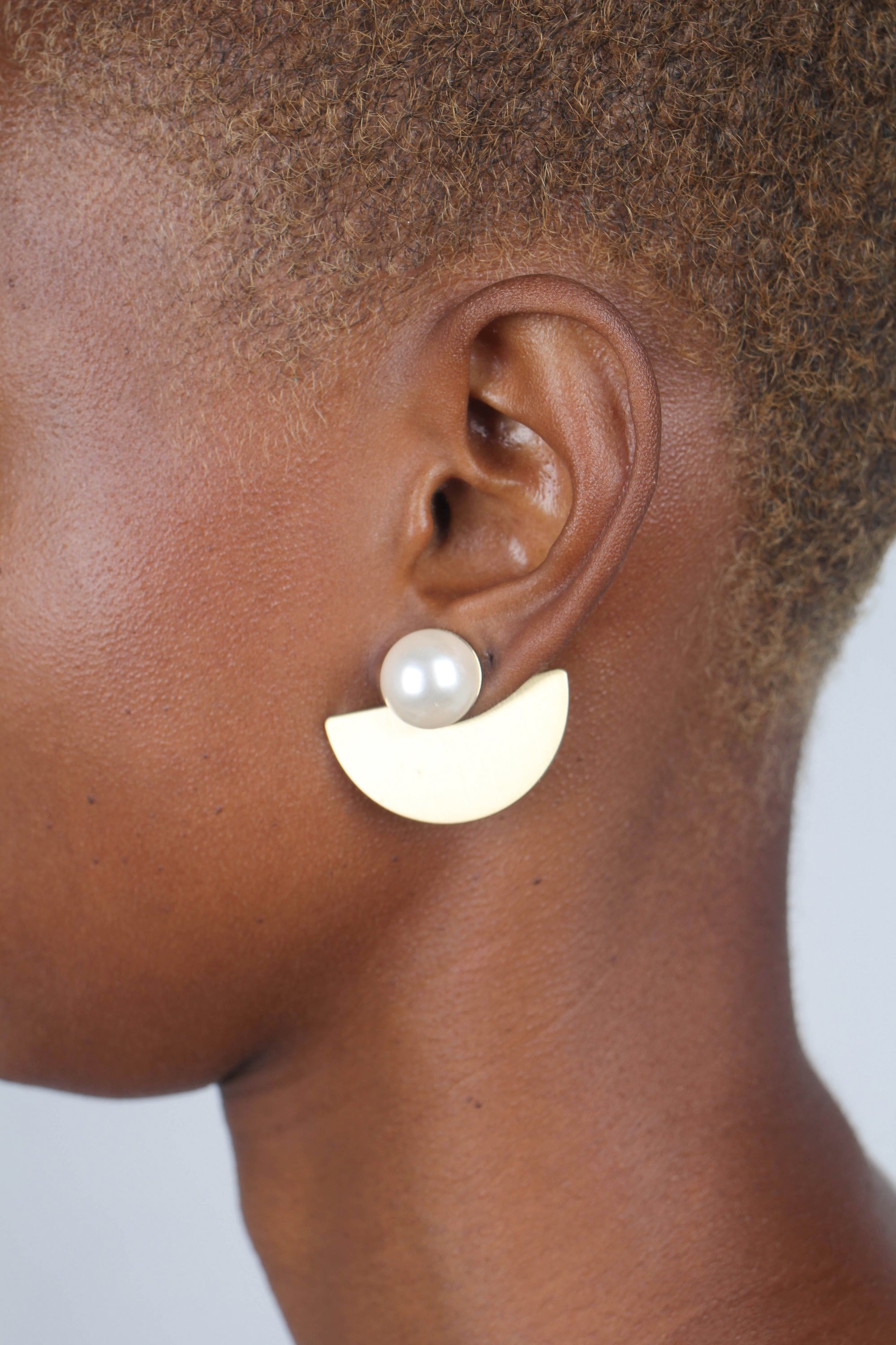Gold giant pearl fan earrings