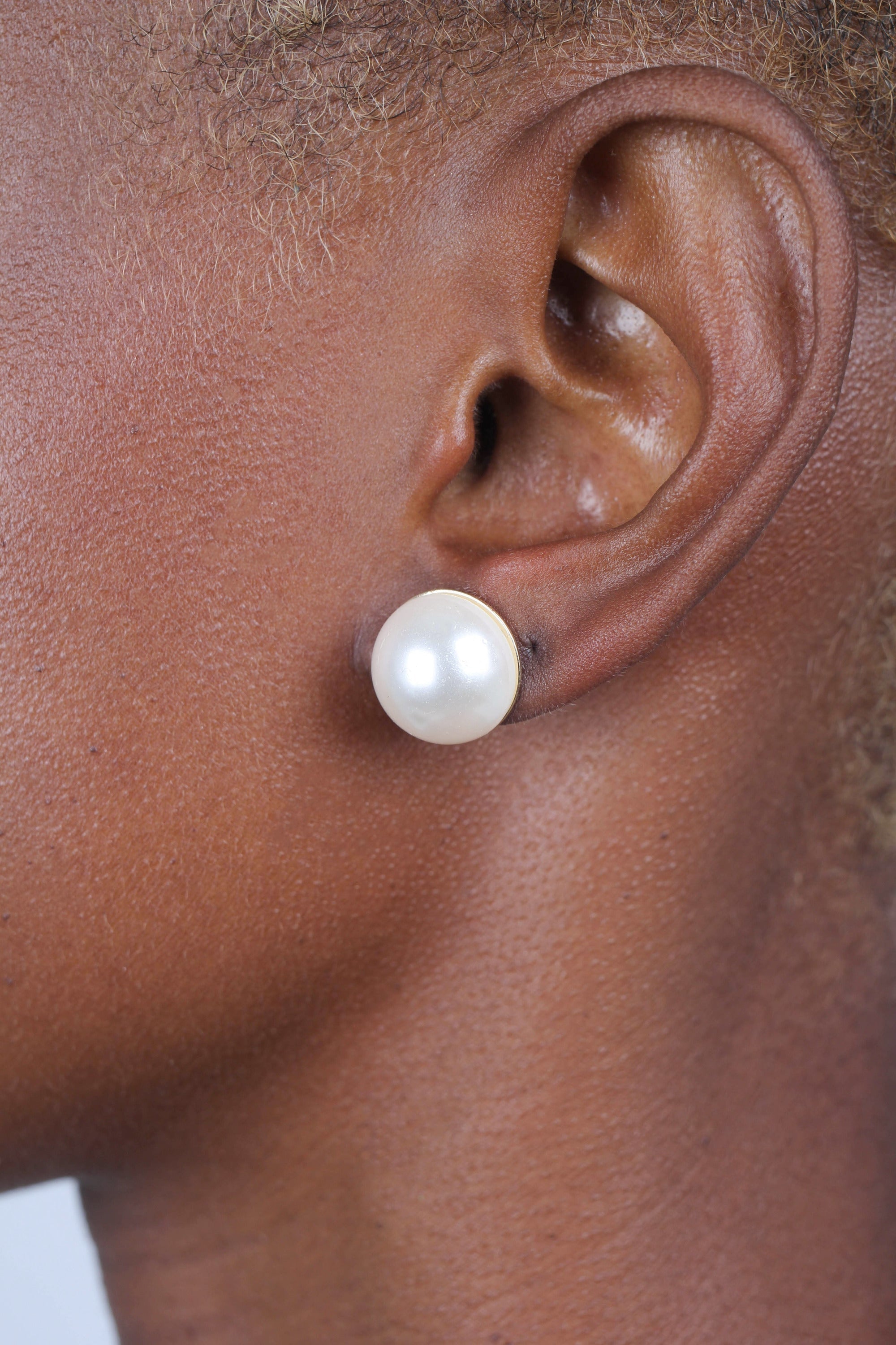 Gold giant pearl fan earrings