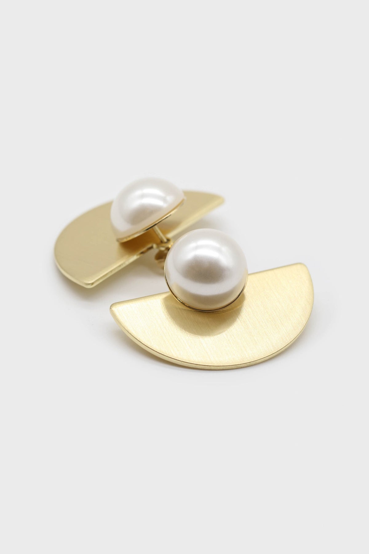 Gold giant pearl fan earrings