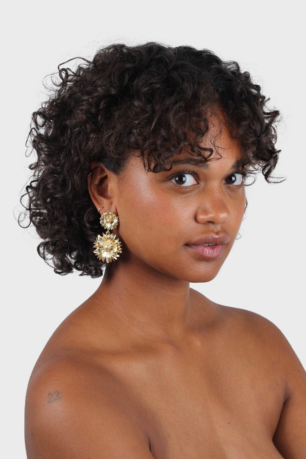 Gold daisy double drop earrings