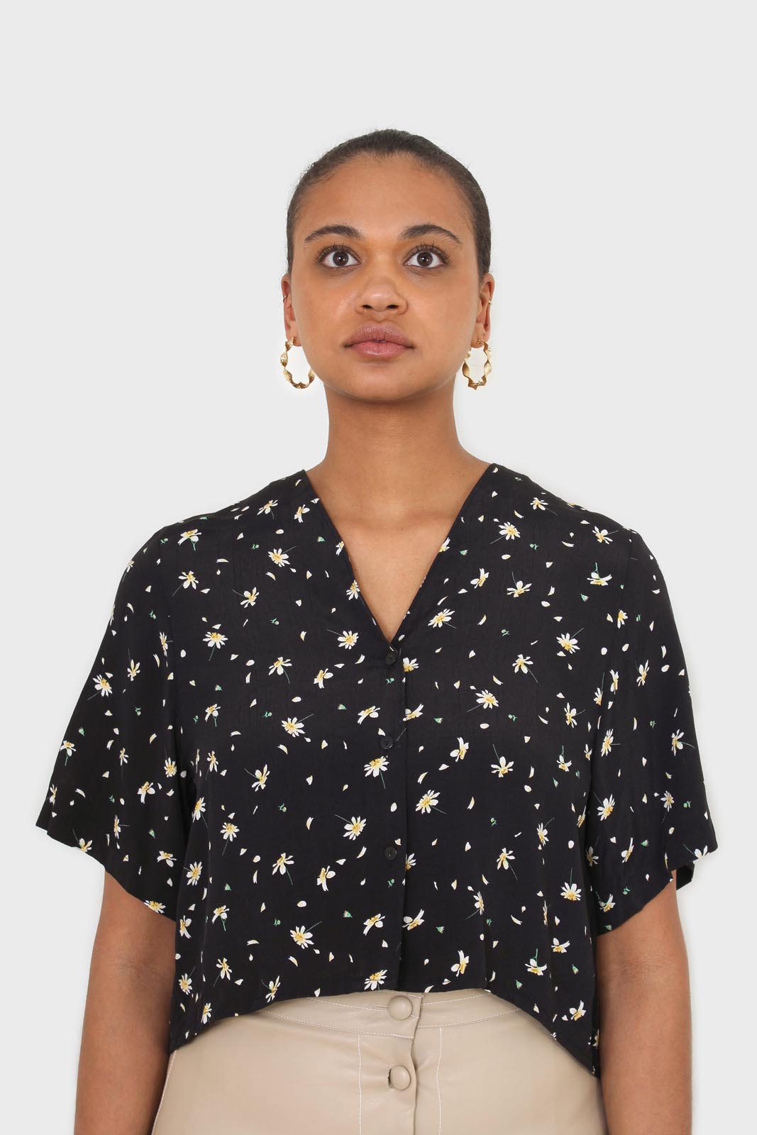 Black daisy print short sleeved blouse